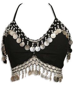 a black top with silver coins and tassels hanging from it's back