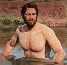 a man with no shirt is in the water and has his hands on his hips