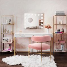 a white desk with pink chairs and a mirror on the wall in front of it