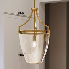 An UHP4256 Unique Pendant 23.375''H x 15.25''W, Brushed Bronze Finish from the Coronado Collection by Urban Ambiance is hanging over a Cabinet Update, Pier Light, Vera Cruz, Transitional Pendant Lighting, House Remodel