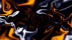 an orange and black background that is very blurry