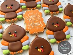 cookies decorated to look like turkeys with the words cookie for the world on them