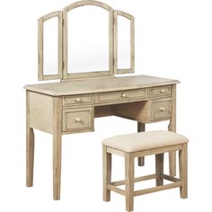 a wooden desk with a mirror and stool