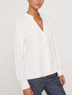 Galey button-down long sleeve white blouse front view Classic V-neck Blouse With Relaxed Fit, Classic V-neck Relaxed Fit Blouse, Classic V-neck Blouse For Daywear, Elegant Button-up Tops For Layering, Classic Split Neck Spring Blouse, Classic Split Neck Blouse For Spring, Fitted Blouse With Shirttail Hem And Placket, Elegant Blouse With Shirttail Hem And Placket, Split Neck Placket Top For Work