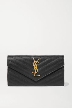 Detailed with the signature 'YSL' plaque, SAINT LAURENT's wallet has been made in Italy from quilted textured-leather. It's fitted with two compartments for tickets or receipts, multiple card and bill slots and a zipped pocket for coins. Slip it into your tote or carry it as a mini clutch. Expensive Purses, Ysl Clutch, Ysl Wallet, Luxury Clutch, Envelope Wallet, Saint Laurent Wallet, Luxury Purses, Luxury Wallet, Designer Wallets