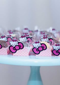 hello kitty cupcakes on a cake stand