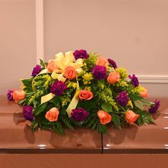 Our "With Sympathy & Love" Casket Spray beautifully celebrates the life of a loved one. Each arrangement is handcrafted by our talented designers. This arrangement is designed in vibrant colors includes roses, carnations & solid aster & a bow nestled in the flowers. 30 Gifts, Pet Gift