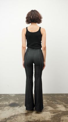 Introducing our Black Zig-Zag Flare Pants: a bold statement in contemporary fashion. These pants feature a distinctive zig-zag pattern that adds an edge to the classic flare style. Crafted for those who dare to stand out, they're perfect for creating memorable looks. Pair them with a sleek top for a balanced ensemble, or go bold with contrasting patterns. Ideal for fashion-forward individuals seeking to make a statement. XS S M L XL Chest/sm 84 88 92 96 100 Waist/sm 64 68 72 76 80 Hip/sm 92 96 1 Fitted Wide Leg Bottoms With Contrast Stitching, Fitted Wide-leg Pants With Contrast Stitching, Fitted Black Linen Bottoms, Zig Zag Pattern, Contemporary Fashion, Flare Pants, Zig Zag, Fashion Forward, How To Memorize Things