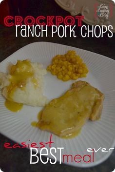 a white paper plate topped with meat and gravy on top of a table