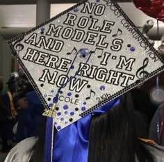 a graduation cap that reads, no role models and i'm here right now