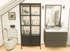 a bathroom with a toilet, sink and shelves