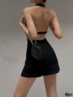 Bjux - Chic Sleeveless Halter Neck Bodycon Dress: A Fashionable and Elegant Addition to Womens Wardrobe Chic Sleeveless Stretch Backless Dress, Casual Backless Halter Dress For Party, Trendy Halter Neck Mini Dress For Going Out, Trendy Sleeveless Backless Dress For Night Out, Casual Backless Sleeveless Dress For Evening, Casual Halter Neck Backless Dress For Night Out, Casual Halter Neck Mini Dress For Going Out, Casual Backless Sleeveless Dress For Night Out, Sleeveless Backless Dress For Summer Outings