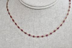 Nura Ruby Bezel Necklace Station Necklace Bezel Setting 18K Yellow Gold BC9330 Handmade Jewelry Classic Oval Ruby Necklace, Formal Ruby Necklace With Bezel Setting, Oval Ruby Necklace In Yellow Gold, Oval Cabochon Ruby Jewelry With Bezel Setting, Bezel Necklace, Full Eternity Ring, Ruby Necklace, Station Necklace, Gold Design