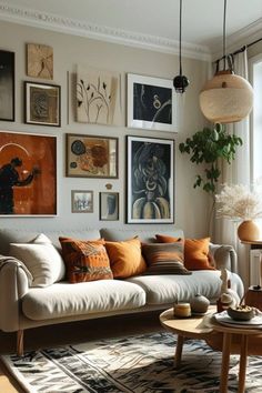 a living room filled with furniture and lots of pictures on the wall above it's couch