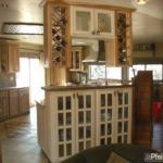 the kitchen is clean and ready to be used as a living room or dining area