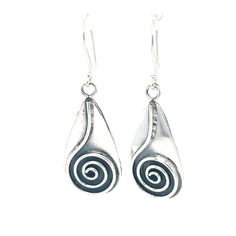 Keep it edgy and chic with these ravishing silver spiral statement earrings. The single spiral is an ancient symbol representing the radiance of cosmic energy and the pathway to a higher level of consciousness, growth, knowledge, and perseverance. These captivating earrings have a touch of old-world charm while embracing the modern age. Materials: .925 Sterling Silver Approximate length 2 inches long Silver Teardrop Earrings With Artistic Design, Modern Twist Silver Spiral Earrings, Silver Spiral Earrings, Spiral Sterling Silver Pierced Earrings, Silver Swirl Earrings, Unique Spiral Silver Earrings, Hypoallergenic Spiral Metal Earrings, Unique Silver Spiral Earrings, Unique Silver Swirl Earrings