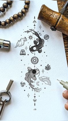 a person is drawing on paper with ink and some other items around it, including a pen