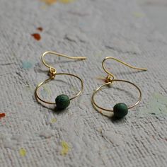 The Lichen mini hoops feature a small turquoise etched glass bead on a round hoop that is wire-wrapped and secured to an elegant ear wire. These hoop earrings are mindfully made with high-quality, gold-plated metals. They are nickel-free and safe for sensitive ears. If you have additional allergies, please contact me before purchasing. I have sterling silver, gold-filled, or hypoallergenic titanium ear wires available by request. The earrings are approximately 1 1/4" long x 3/4" wide, including Jewelry Safe, Etched Glass, Paper Tape, Handmade Gold, Glass Etching, Cotton Pads, Sensitive Ears, Ear Wire, Glass Bead