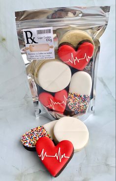 heart shaped cookies with sprinkles in a bag