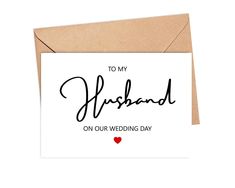 a card with the words to my husband on our wedding day written in black ink