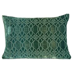 a green decorative pillow on a white background