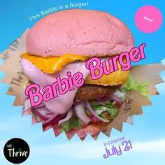 a burger with an egg on it and the words barbieburger written in large letters