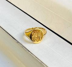 An Antique Estate 14k Yellow Gold Signet Crest Ring with British Hallmarks All items are XRay and Acid tested to ensure metal authenticity. All pieces in this store are solid gold in the purity listed unless otherwise stated.  Weight: 9.5 grams Ring Size: 8.25 (resizing possible upon request depending on the size) Signet Rings, Crown Jewels, X Ray, Signet Ring, Hallmark, Solid Gold, Jewelry Rings, Ring Size, Yellow Gold