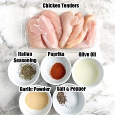 the ingredients for chicken tenders in bowls on a marble counter top, including seasoning, garlic powder, salt and pepper