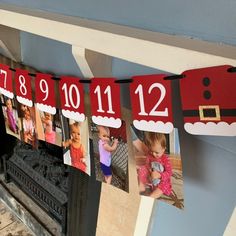 some pictures hanging from a clothes line with santa's hat and stockings on it