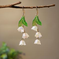 🙂"Return of happiness" is the symbolism of "Lily of the valley". Vitality and hope are the symbols of green leaves These sparkle Lily of the valley earrings bring sincere blessings whether for your own use or as a gift for the one you love. May these earrings brighten up your life. 🙂 All my jewellery is designed and made at home. Handmade with love. 🙂Introducing these stunning handmade earrings, a pair of earrings made with resin Lily of the valley and S925 Gold Plated Silver hooks. The cryst White Flower Earrings, White Flower Earring, Unique Brooch, Wedding Bridesmaid Jewelry, Jewelry Bridesmaid, Sparkle Earrings, Wedding Bridal Jewellery, Bridesmaid Earrings, Lily Of The Valley