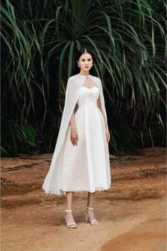 Women's Savi Fit and Flare Cap Sleeved Cotton Velvet Midi Set S/M/L White/Beige MEAN BLVD Elegant Cape Dress For Banquet, Elegant Fitted Cape Dress, Evening Dress With Fitted Bodice And Cape Sleeves, Fitted Cape Evening Dress For Banquet, Cape Evening Dress With Draped Sleeves For Wedding, White Dresses With Cape Sleeves, White Gown With Cape Sleeves For Evening, Elegant Fitted Cape Gown, Elegant Fitted Gown With Cape