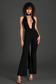 Grace the occasion in our hollow backless jumpsuit, a captivating ensemble designed to elevate your style with grace and sophistication. This jumpsuit features intricate hollow back detailing and draped ribbon, adding a touch of allure to your wardrobe. Handmade customization Fabric composition: 90% polyester fiber, 10% spandex Washing method: hand wash or dry clean Popular elements: hollow Elegant V-neck Party Bodysuit, Elegant Strapless V-neck Jumpsuit For Night Out, Chic V-neck Jumpsuits And Rompers For Party, Chic V-neck Jumpsuits And Rompers For Gala, Elegant Strapless V-neck Jumpsuit For Party, Backless Strapless Jumpsuit For Summer Formal, Summer Formal Backless Strapless Jumpsuit, Elegant Fitted Bodysuit With Back Opening, Glamorous Fitted Halter Neck Jumpsuits And Rompers