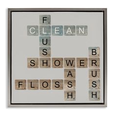 a scrabble tile sign with words that say clean, us shower, floss, and hush