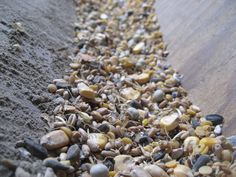 a close up of rocks and gravel on the ground