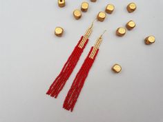 Minimalist red beaded earrings Long Gold Red fringe earrings | Etsy Handmade Red Long Drop Beaded Earrings, Red Tassel Earrings With Round Beads As Gift, Red Long Drop Beaded Earrings, Elegant Red Earrings With Tiny Beads, Elegant Red Beaded Earrings With Fringe, Red Gold Beaded Drop Earrings, Vibrant Red Beaded Earrings, Red Fringe, Toho Beads