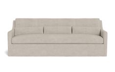 a beige couch sitting on top of a white floor