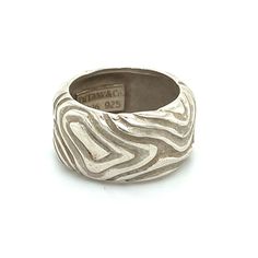 Authentic Tiffany & Co Estate Woodgrain Design Ring 4.5 Silver 11 mm 5.7 Grams TIF630TRUSTED SELLER SINCE 2002DETAILDesign: WoodgrainRing Size: 4.5Height: 11 mmWeight: 5.7 GramsMetal: Sterling SilverWe try to present our estate items as best as possible and most have been newly polished some of the Tiffany items may have a natural patina As they are estate silver pieces. Please refer to the pictures as they are the actual items you will receive. Please see the pictures as this is the exact item Contemporary Round Rings For Anniversary, Modern Etched Rings, Tiffany Co Rings, Tourmaline Bracelet, Tourmaline Necklace, Tourmaline Ring, Georg Jensen, South Sea Pearls, Cufflinks Men