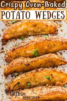 crispy oven baked potato wedges on a baking sheet with text overlay that reads crispy oven - baked potato wedges