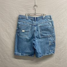 38" Waist / Y2K Vintage Baggy Distressed Painter Carpenter Jean Shorts Bloke Core Jorts Flat Waist: 19in // Length Top to Bottom: 24in // Inseam: 12in Hole on the side seam, and some small pinholes on the front. Overall worn. Great super baggy look shorts. Y2k Style Short Pants With Pockets, Y2k Short Pants With Pockets, Y2k High-rise Shorts With Pockets, Y2k High Rise Shorts With Pockets, 90s Style Short Jeans, Y2k Style Short Bottoms With Belt Loops, Y2k Short Bottoms With Belt Loops, 90s Style Short Jeans With Pockets, Vintage Jean Shorts With Pockets For Streetwear