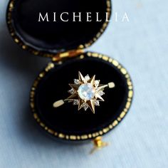 "Our current turnaround time for regular orders is 6-8 weeks. For urgent orders, please shop our Ready-to-Ship collection below (7-10 business days): https://michellia.com/collections/ready-to-ship (please copy and paste into browser) -------- 「Astra」- Starlight Ring, in Forever One Moonstone | R3009 Astra, meaning \"of the stars\" in Greek, or \"divine strength\" in Latin. Taking the shape of a compass rose, Astra is meant to be more than a pretty symbol; Aside from her unmistakably celestial e Celestial Moonstone Promise Ring, Celestial Moonstone Ring For Wedding, Celestial Moonstone Wedding Ring, Celestial Style 14k Gold Moonstone Ring As Gift, Celestial Diamond Moonstone Ring, Celestial 14k Gold Moonstone Ring As Gift, Celestial 14k Gold Moonstone Ring For Gift, Celestial Opal Ring As Gift, Celestial Moonstone Ring In 14k Gold As Gift