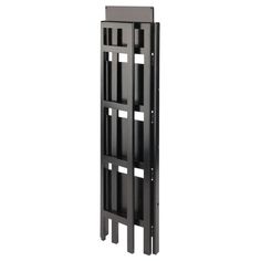 a tall black shelf with four shelves on each side