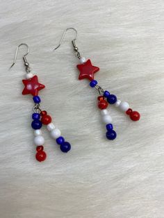 Hi Everyone, New Earrings again, love making patriotic earrings just for you! Handmade Earrings, Red, White, Blue Beads, Red Star Bead, Silver Dangle Earrings. Handmade fashion jewelry accessories perfect simple gifts for her and for everyone.  Perfect for the 4th of July fashion style!! Can be for everyday look for women. So come shop for these pretty earrings.  This pair is about 3 inches from top to bottom. Thank you for looking at my jewelry shop. Anting Manik, Diy Earrings Easy, Patriotic Earrings, Patriotic Jewelry, Beads Craft Jewelry, Jewelry Making Earrings, Handmade Fashion Jewelry, Silver Dangle Earrings, Earrings Red