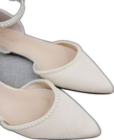 Pearl Embellished Wedding Shoes For Prom, Pearl White Wedding Shoes For Bridal Shower, Chic Pearl Embellished Ankle Strap Wedding Shoes, Elegant Wedding Pointed Toe Flats With Ankle Strap, Elegant Pointed Toe Flats With Ankle Strap For Wedding, Elegant Fitted Wedding Flats, Pearl Wedding Shoes With Pointed Toe, Elegant Bridesmaid Pointed Toe Flats, Elegant Fitted Flats For Wedding