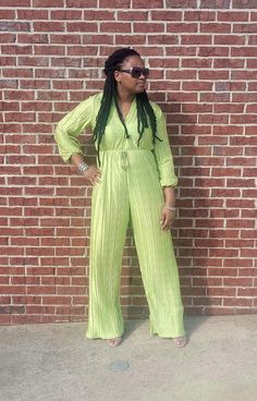 This striking jumpsuit boasts long sleeves, a plunging V-neck in the front and back, and flowy wide legs for a stunning and stylish look! Model is wearing a Medium (Height: 5'5", Waist: 33", Hips: 44", Bust: 39") Material: 100% Polyester The material is very stretchy. Inseam: 33" Color: Lime Green V-neck Jumpsuits For Night Out, Full Length Spring Party Jumpsuits And Rompers, Green V-neck Jumpsuit For Date Night, Spring Green V-neck Jumpsuits And Rompers, Green V-neck Jumpsuits And Rompers For Spring, Green V-neck Jumpsuits And Rompers For Evening, Maxi Length Jumpsuits For Spring Date Night, Spring Full-length Jumpsuits For Night Out, Spring Night Out Full-length Jumpsuits And Rompers