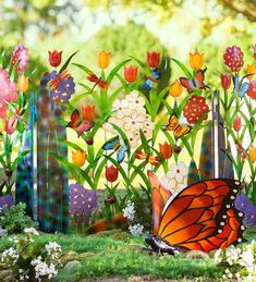 a butterfly sitting on top of a lush green field next to tall grass and flowers