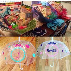 two clear umbrellas with personalized designs on them