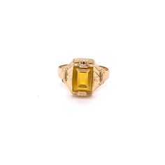 Vintage 1940's 10k yellow gold yellow stone ring. The ring size is a loose 9, and can be resized. The height of the ring off of the finger is 3.9mm. The width of the band is 3.7mm, and tapers down to 2.8mm. Gold Topaz Ring With 17 Jewels In 14k Gold, 14k Gold Topaz Ring With 17 Jewels, Yellow 14k Gold Oval Rings, Yellow Topaz Center Stone Ring In 14k Gold, Vintage Yellow Gold Signet Ring With Gemstone, Art Deco Gold Sapphire Ring In 14k Gold, Gold Art Deco Sapphire Ring In 14k Gold, Art Deco 14k Gold Sapphire Ring, Yellow Topaz Promise Ring In 14k Gold