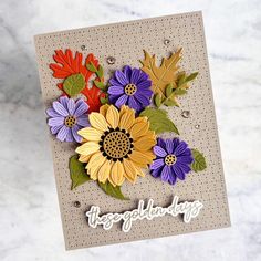 a card with colorful flowers on it