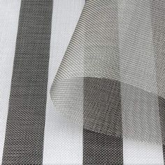 an image of a black and white checkered fabric with grey stripes on the side