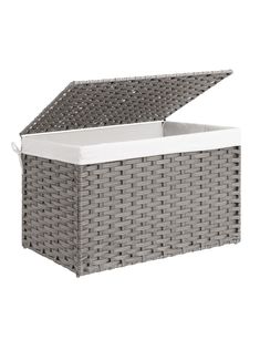 a gray wicker storage box with lid and white lining on the bottom, sitting against a white background